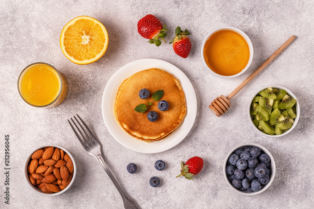 Pancakes with fruit, honey, nuts. Pancakes with fruit, honey, nuts.