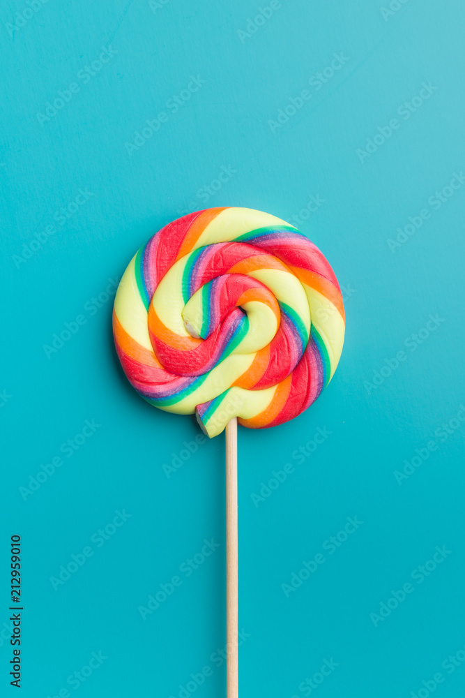 Colorful rainbow swirl lollipop.