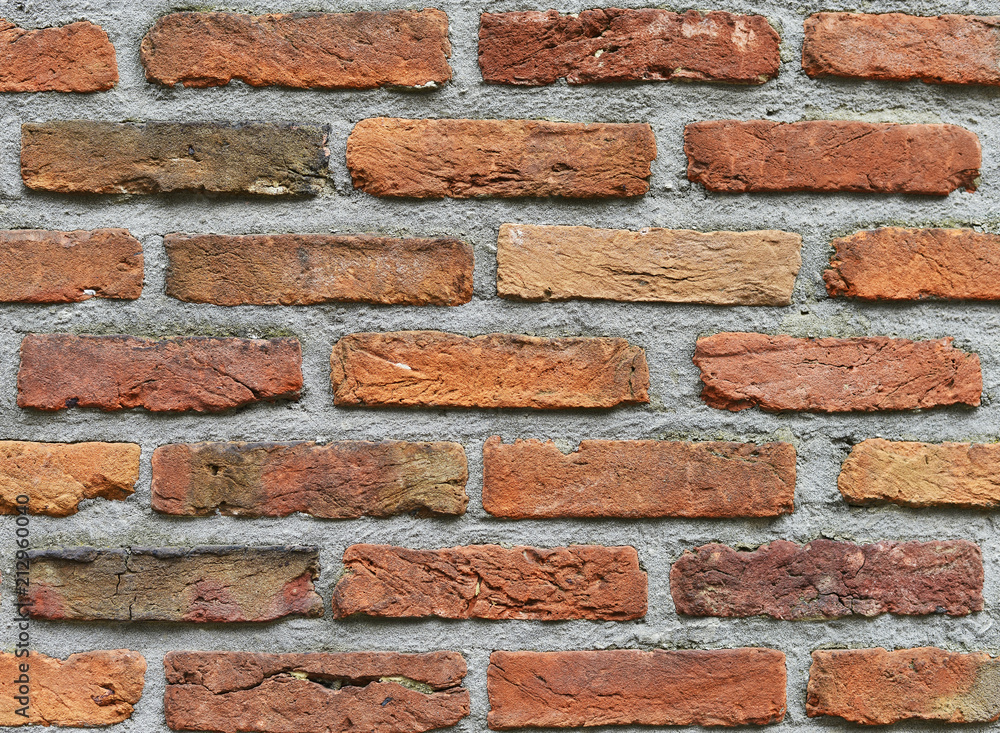 Fototapeta premium Old red block and concrete wall texture