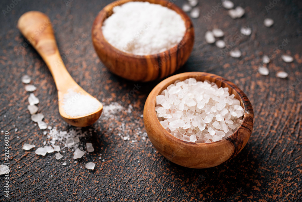 White sea salt on rusty background White sea salt on rusty background