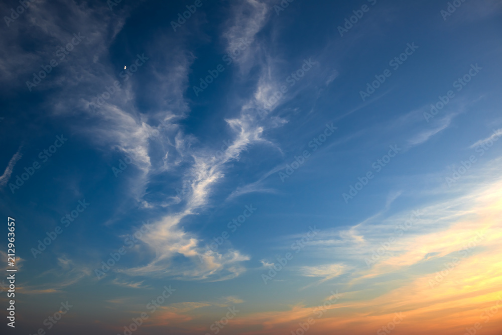 Fototapeta premium beautiful sunset with moon and sky as background, colorful clouds