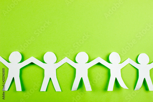 Origami cut paper people. Team concept