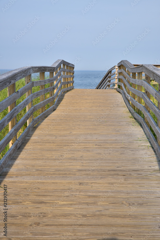 walkway boardwalk to sandy beach on Atlantic ocean