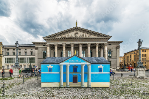 Munich, Germany June 09, 2018: National Theater neoclasical styled building at Max Joseph square in old town in a sunny day. This landmark acts as the Bayerische Staatsoper headquarters photo