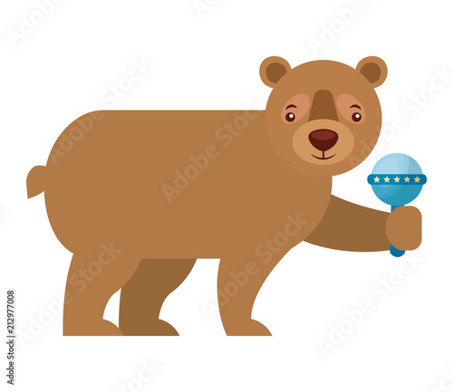 brown grizzly bear holding rattle toy