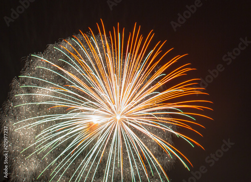 White and Orange Fourth of July Fireworks on Lake Sawyer in Washington State