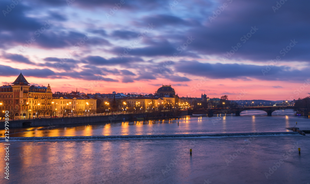 View of colorful old town in Prague taken from Charles bridge at sunrise, Czech Republic