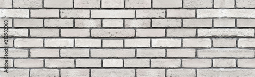 Panorama of old white brick stone wall texture and background