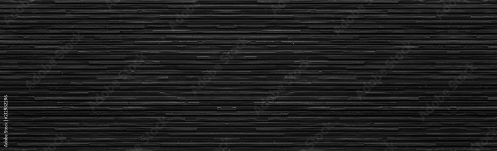 Naklejka premium Panorama czarny nowożytny kamiennej ściany tło i wzór