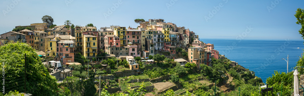 Panoramic View of the city of Corniglia  on Blue Sky and Sea Background in the Italian National Park of the Cinque Terre.