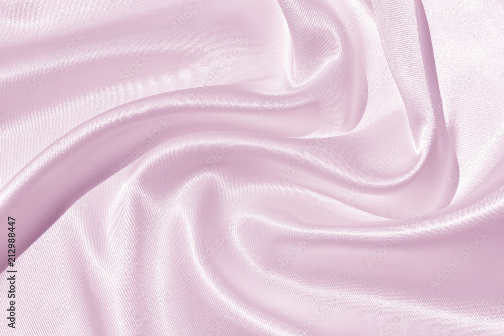 Obraz premium The texture of the satin fabric of lilac color for the background 