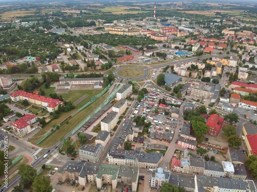 Aerial view on a cityscape with buildings, park and roundabout