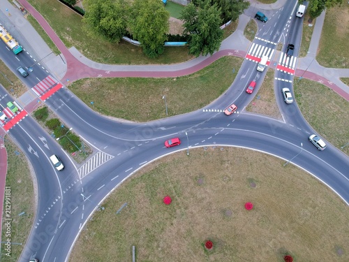 Roundabout intersection in two directions with island, aerial view