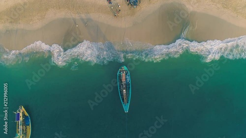 Indonesia traditional fishing boats docked in shores after fishing an aerial view, Papuma beach Jember
