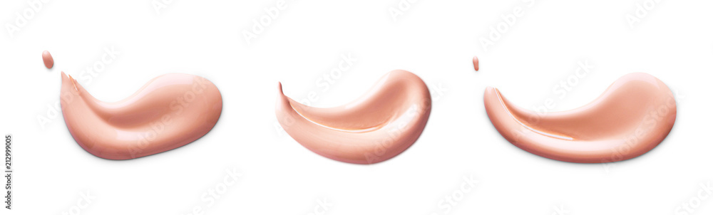 Cosmetic liquid foundation cream smudge smear strokes. Make up smear isolated on white background Cosmetic liquid foundation cream smudge smear strokes. Make up smear isolated on white background