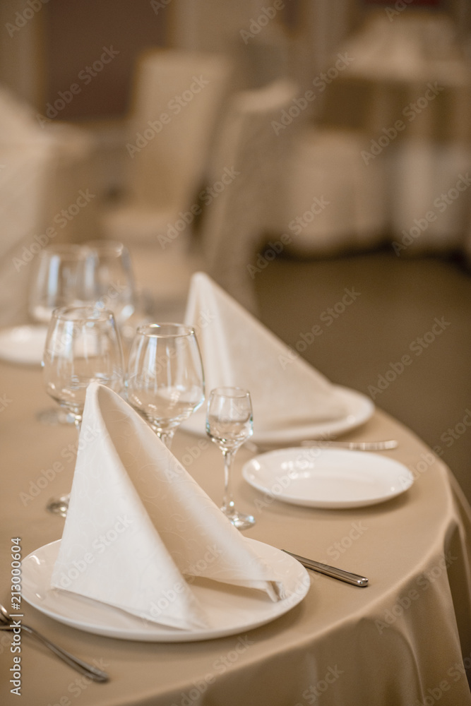 Fototapeta premium Elegant serving of a festive dinner in the restaurant table