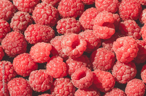 Ripe red raspberries. Greeting card with fruits