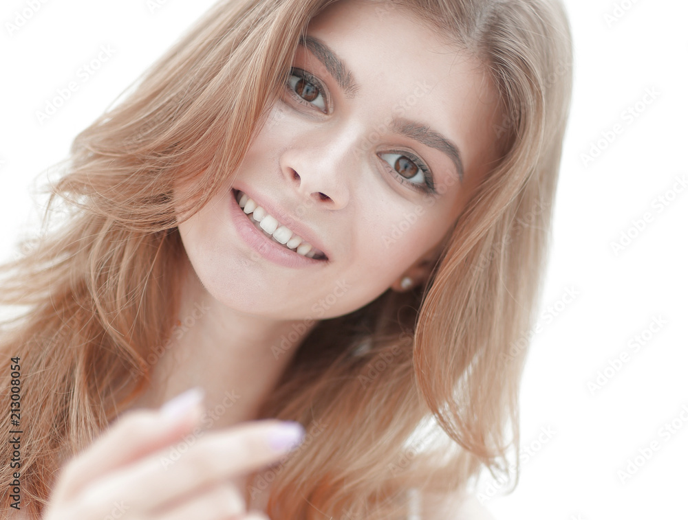 closeup portrait of a smiling young woman with light make-up. closeup portrait of a smiling young woman with light make-up.