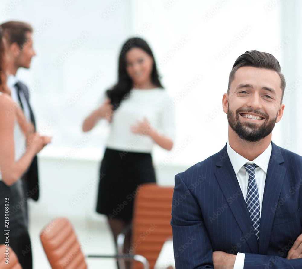 businessman on background of office. businessman on background of office.