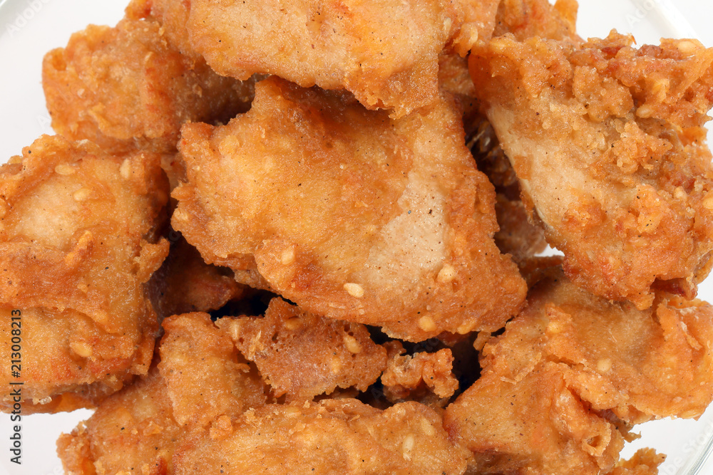 Deep Fried Chicken Wings Drumstick Nuggets Popcorns on white background Deep Fried Chicken Wings Drumstick Nuggets Popcorns on white background
