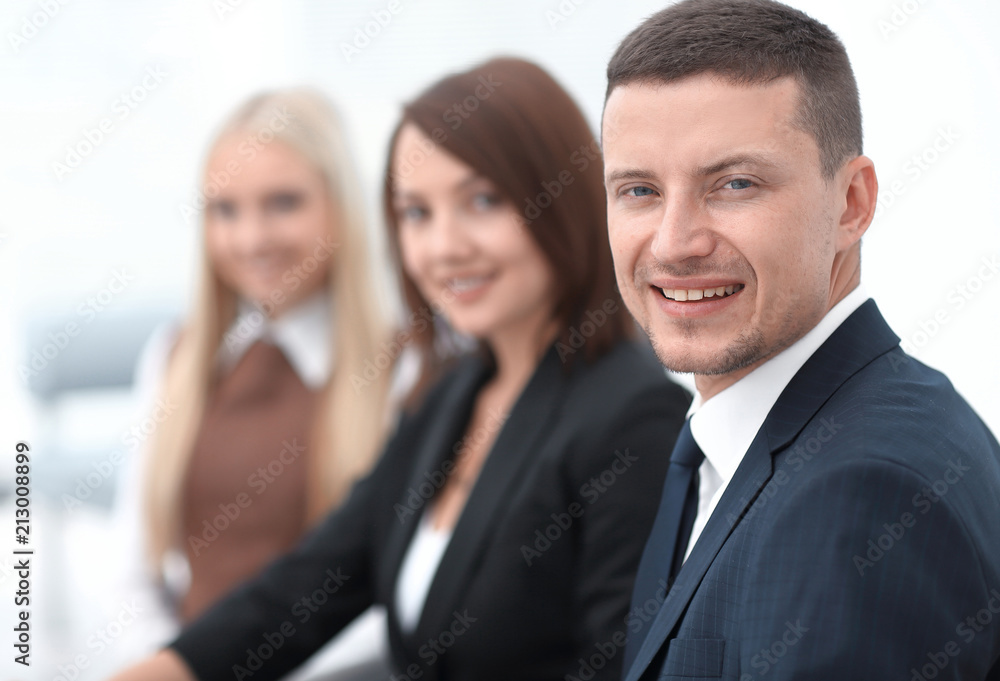 closeup of business people sitting at a meeting the conference room. closeup of business people sitting at a meeting the conference room.