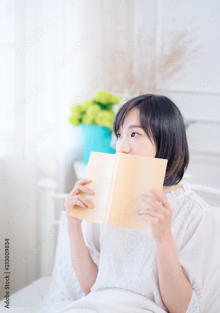 young beautiful girl reading a book young beautiful girl reading a book