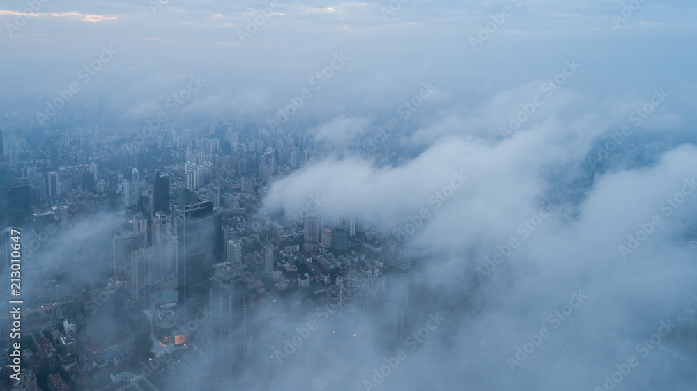 Obraz premium Aerial View of Shanghai city in the morning fog