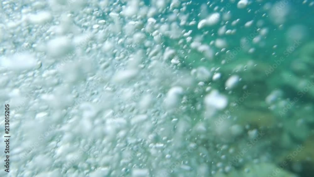 Bubbles rising to the surface. Air bubbles in water in sea (underwater shot), good for backgrounds. Slow motion.
Bubbles rising to the surface. Air bubbles in water in sea (underwater shot), good for backgrounds. Slow motion.