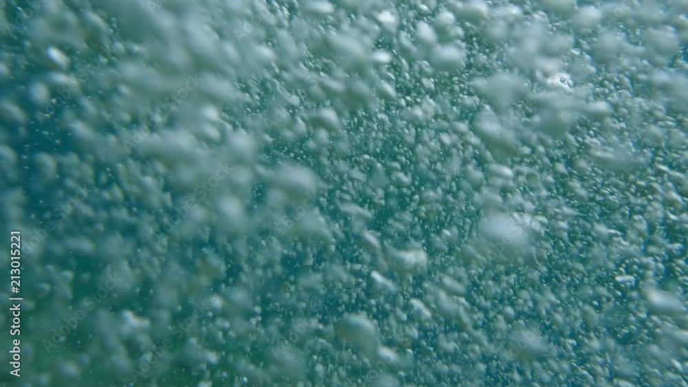 Bubbles rising to the surface. Air bubbles in water in sea (underwater shot), good for backgrounds. Slow motion.
Bubbles rising to the surface. Air bubbles in water in sea (underwater shot), good for backgrounds. Slow motion.