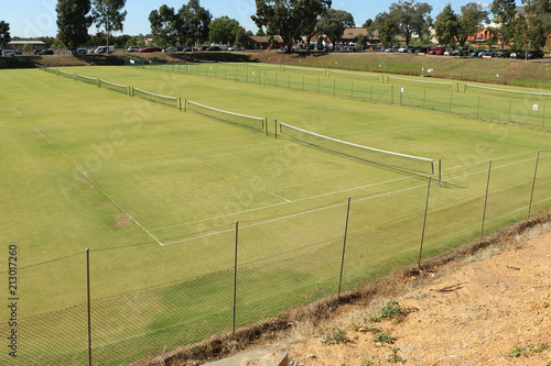 the bays of lawn tennis courts with nets