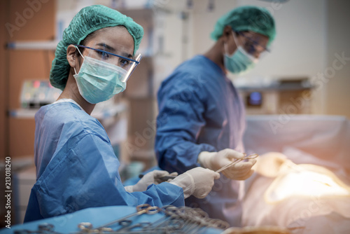 team of surgeons working in the operating room, medical concept 