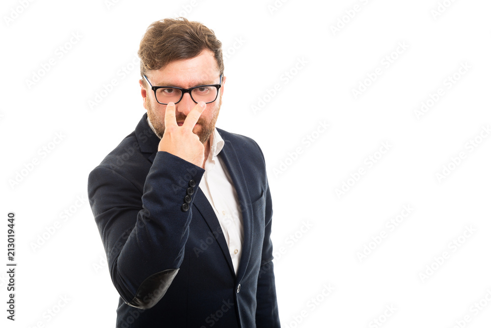 Portrait of business man showing watching you gesture. Portrait of business man showing watching you gesture.