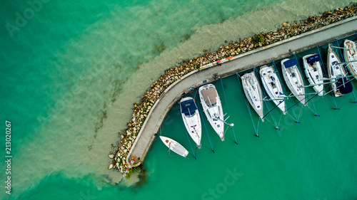 Canvas Print Sailboats and small yachts anchored at Lake Balaton, Hungary