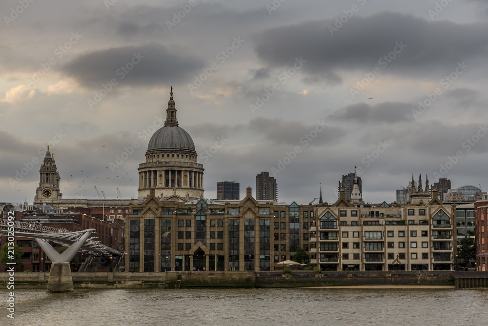 St Paul's Cathedral, as seen from the South Bank of the river Thames.  The Millennium footbridge can be seen in the left of the picture