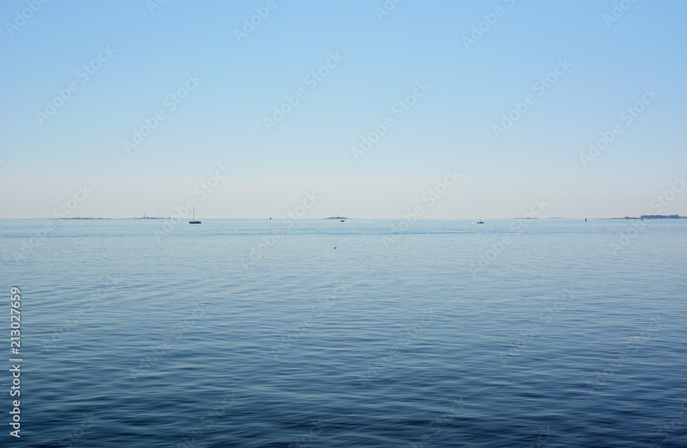Calm blue waters and clear sky above in the Finnish gulf
