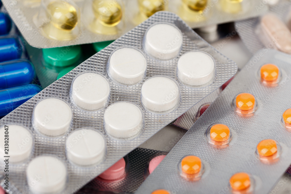 the group of color medical pills in packages the group of color medical pills in packages