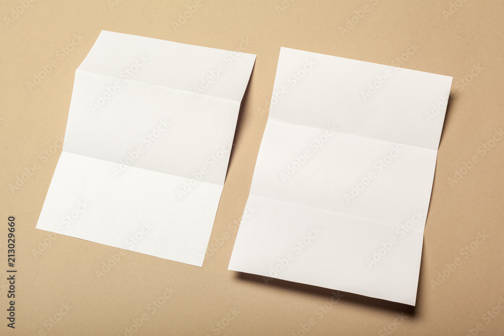 Blank paper pieces for mock up on a beige background Blank paper pieces for mock up on a beige background