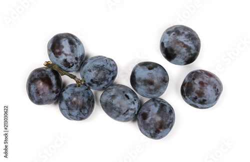 Fresh plums isolated on white background, top view
