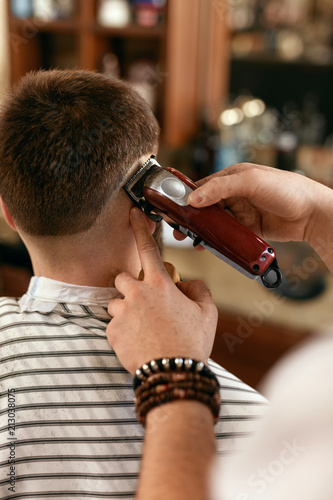 Men Hair Cut In Barber Shop Close Up