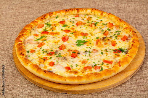 Seafood pizza with tomatoes