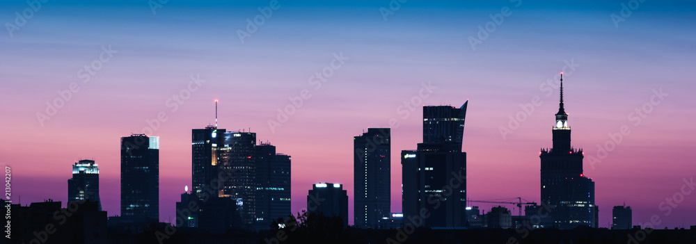 Panorama of skyscrapers in the center of Warsaw at night, Poland