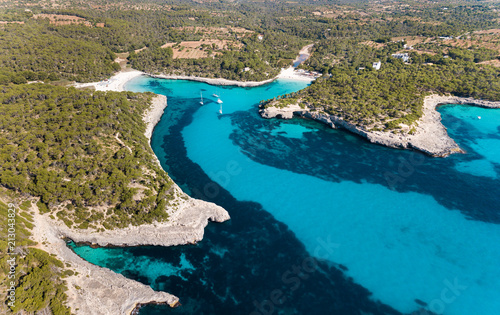 Aerial: The beach of Cala Mondrago in Mallorca, Spain photo