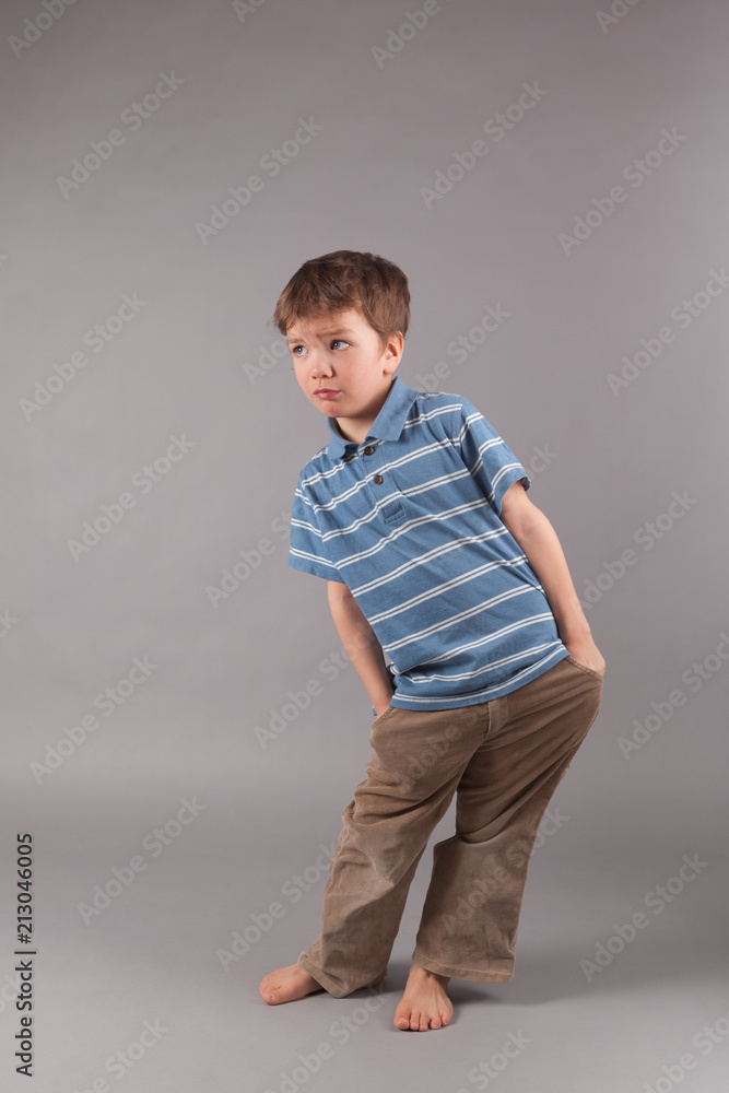 Portrait of little boy on gray backgraund Portrait of little boy on gray backgraund