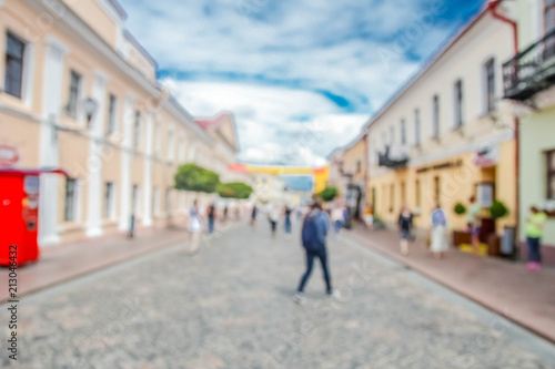  Blurred background of the tourist street of a European city.