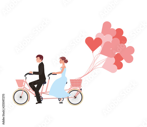just married couple in bicycle and balloons helium with shape heart