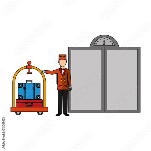hotel bellboy and luggage trolley suitcase elevator doors