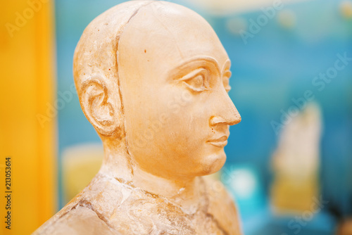 storical artifacts sculpture head, stone head photo