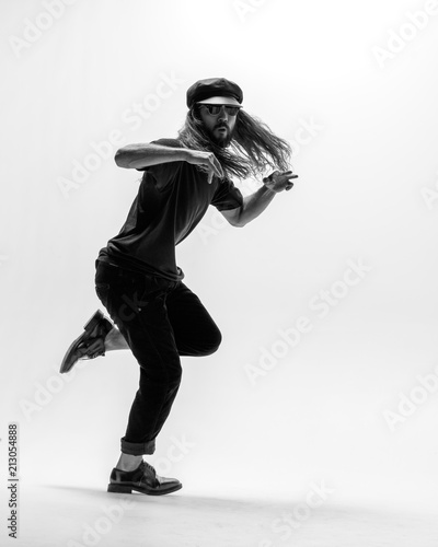 Young beautiful dancer posing in the studio