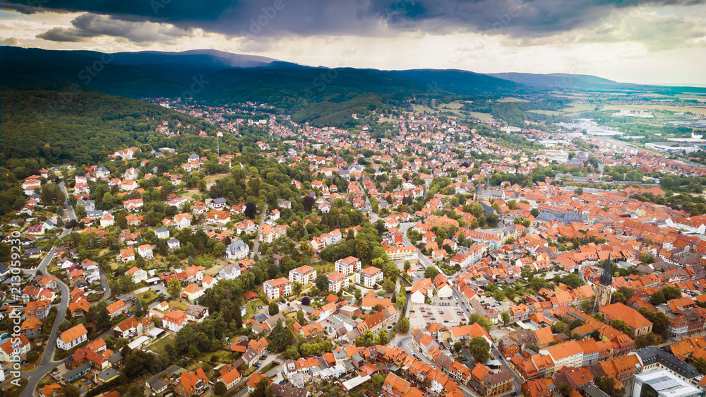 Aerial drone bird's eye view photo of famous and picturesque european village of central germany with red roofs and cozy streets