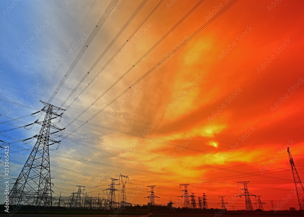 Fototapeta premium Electric tower, silhouette at sunset